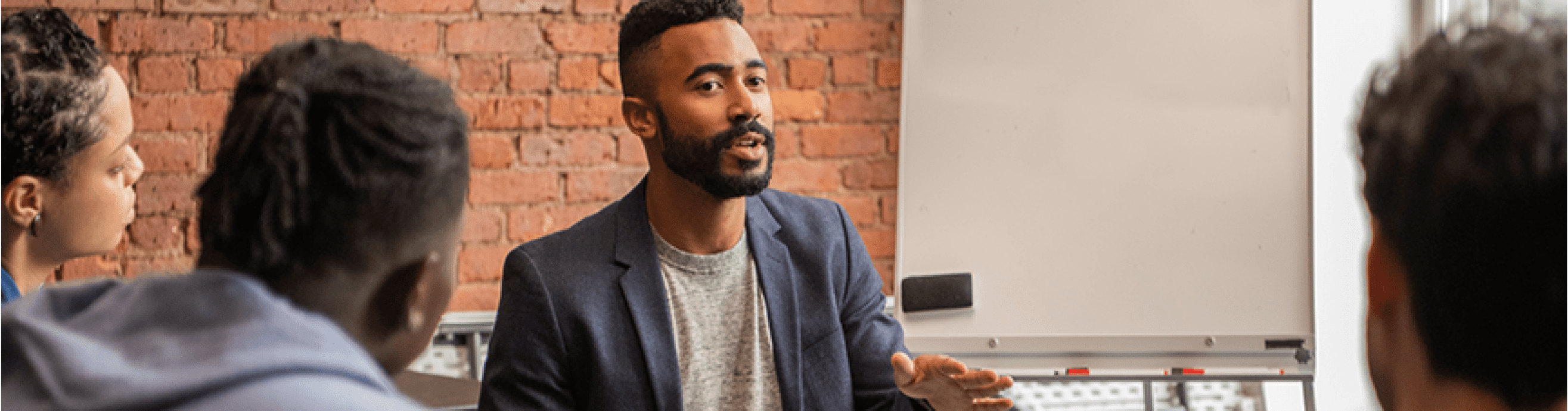 Dimitri is talking to a group.