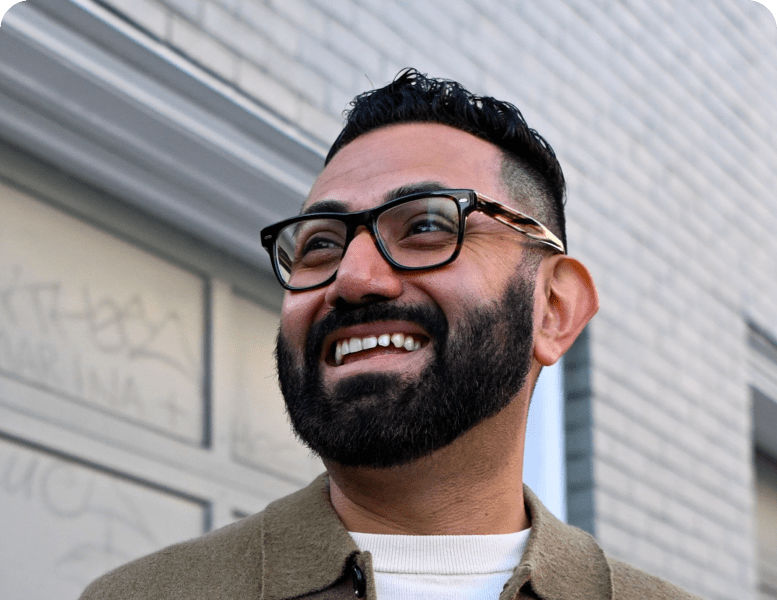 Elias smiling widely.