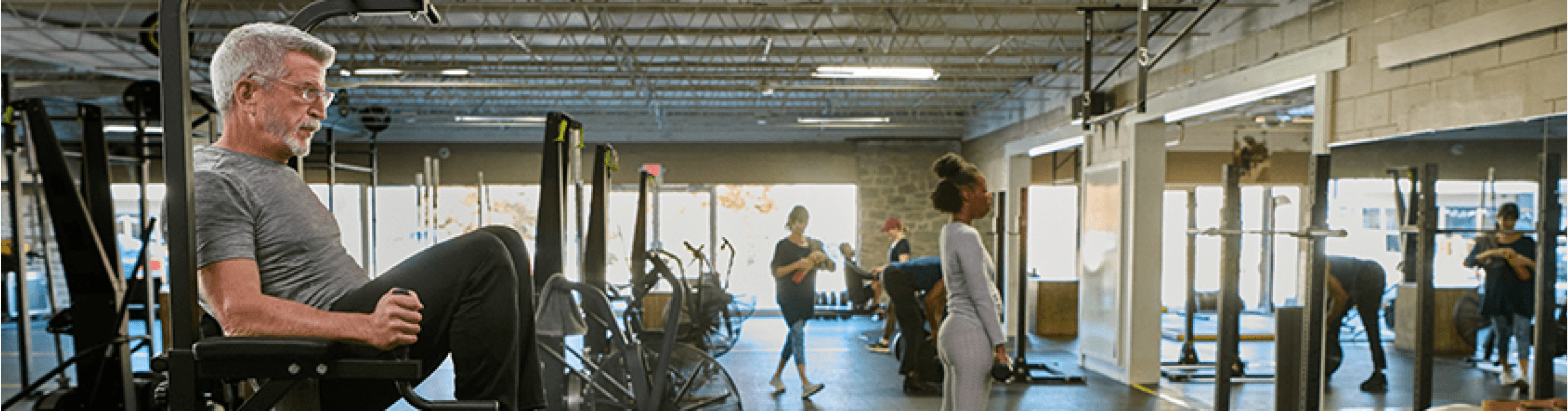 Theron is working out at the gym.